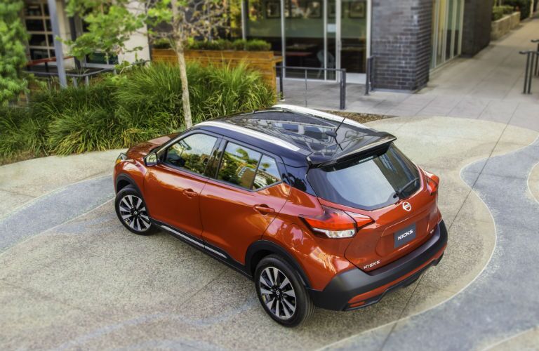 An overhead photo of a 2018 Nissan Kicks parked in a courtyard.