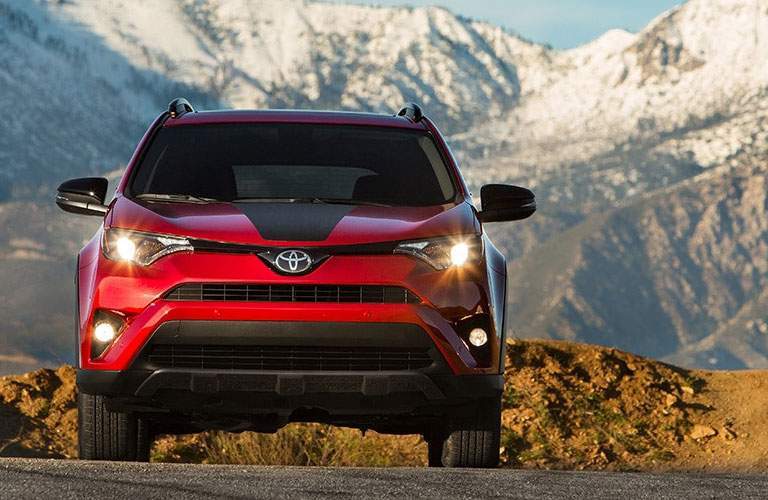 Red 2018 Toyota RAV4 Adventure in Front of Mountains