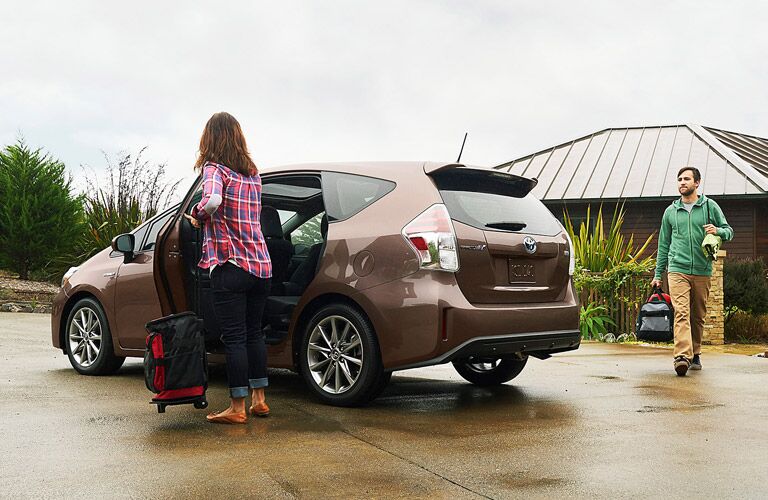 2016 Toyota Prius v being loaded with luggage