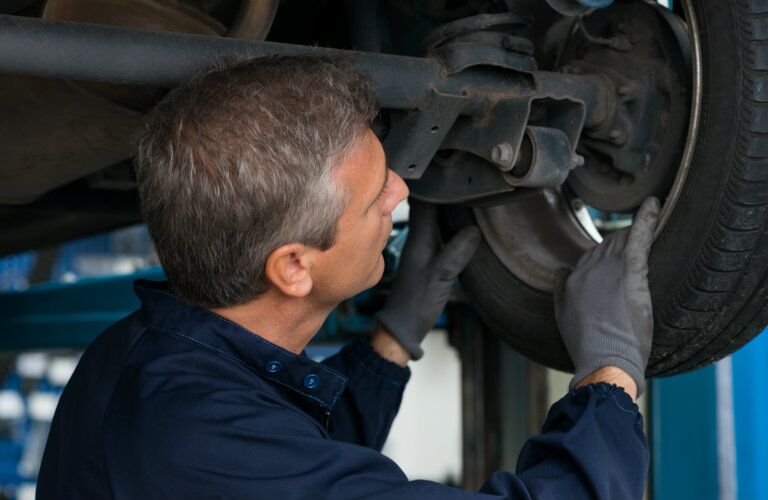 Service Center Working on Tire
