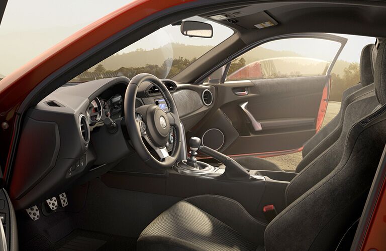side view of front interior of 2019 toyota 86 including steering wheel and seating