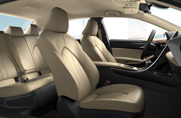 side view of interior of 2019 toyota avalon hybrid including front and rear seating