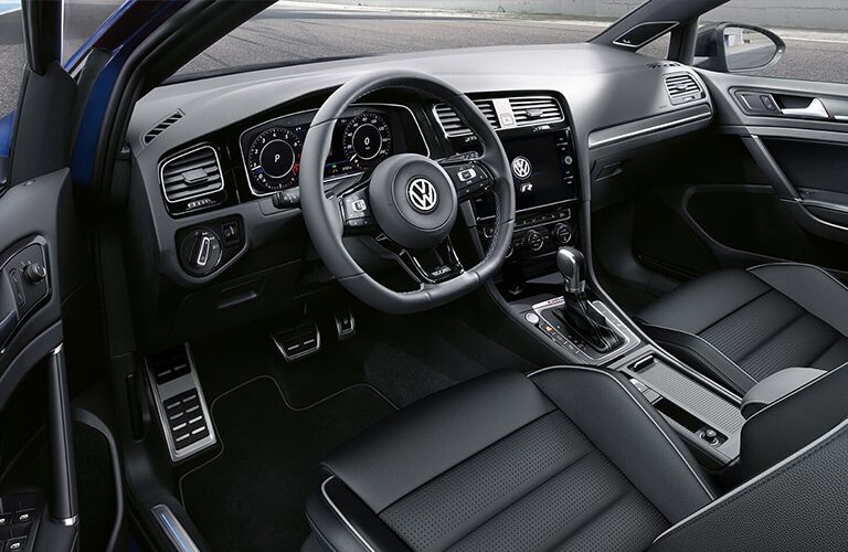 Dashboard and dark grey front seats in 2019 Volkswagen Golf R