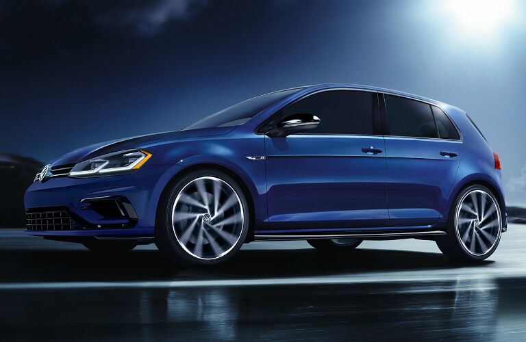 Side view of blue 2019 Volkswagen Golf R
