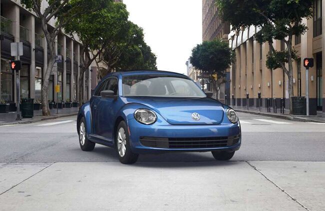2016 VW Beetle Blue Parked