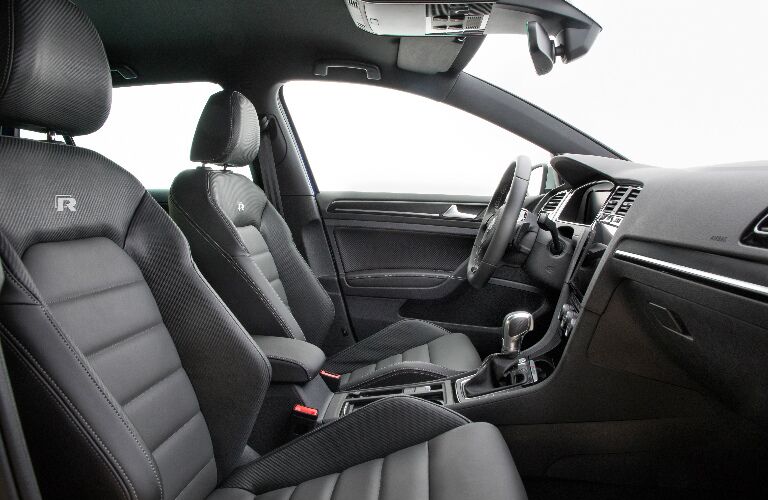 Dashboard and dark grey front seats in 2019 Volkswagen Golf R