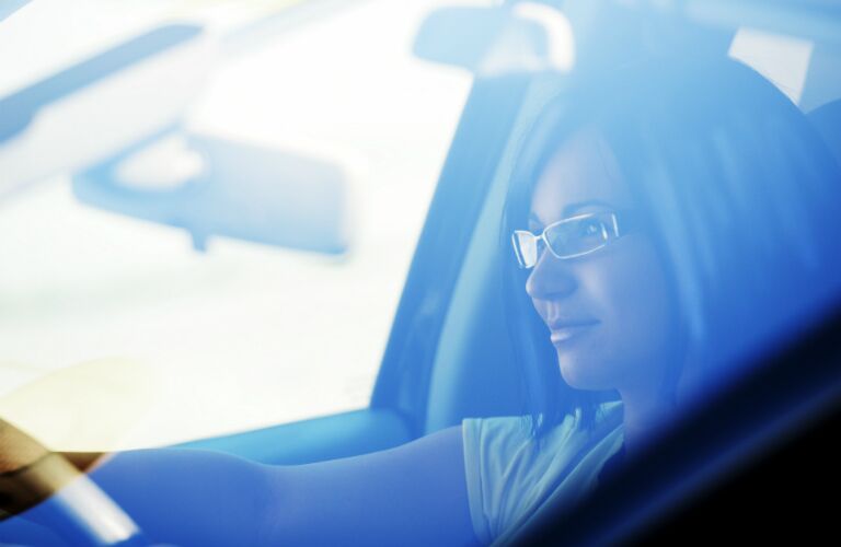 driver enjoying her new car