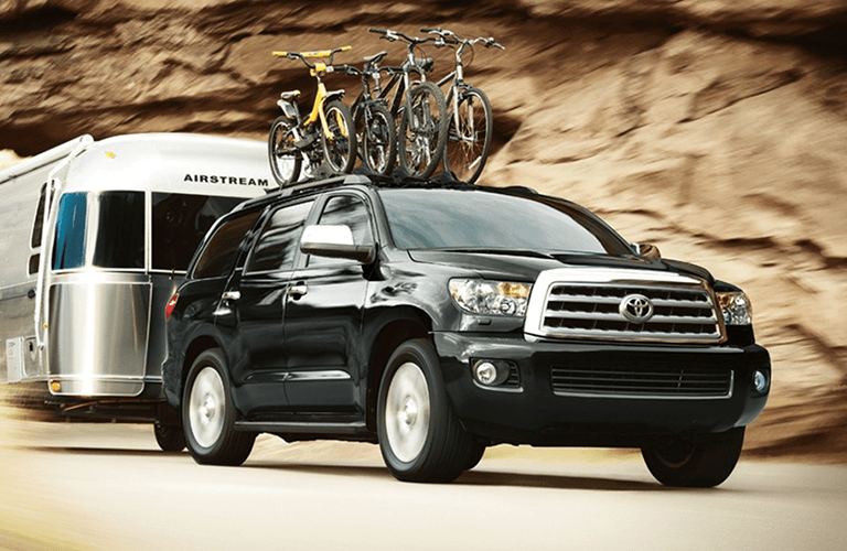 Toyota Sequoia Towing Camper with Bikes on Bike Rack