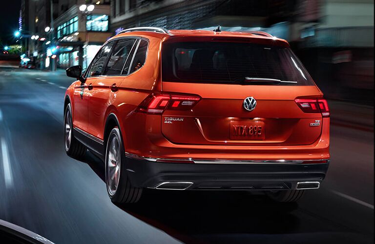 2019 Volkswagen Tiguan driving in a city at night