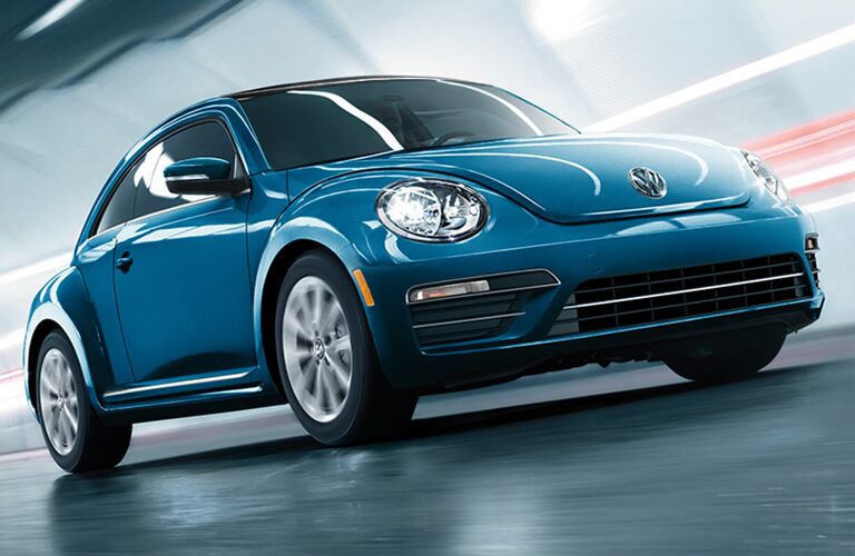 2019 Volkswagen Beetle driving on road
