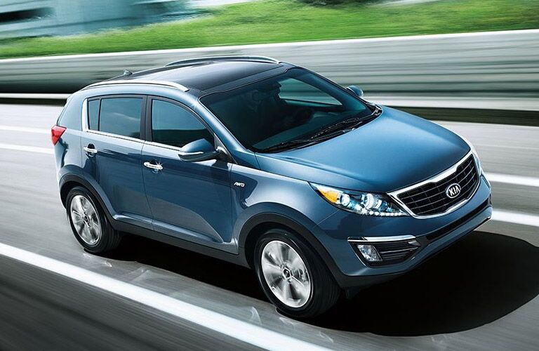 Kia Sportage Side and Front End View in Blue