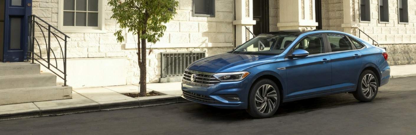2019 Volkswagen Jetta outside a city apartment building