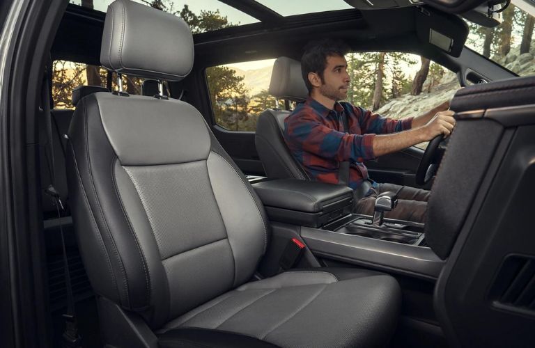 Man Driving 2023 Ford F-150 Lightning