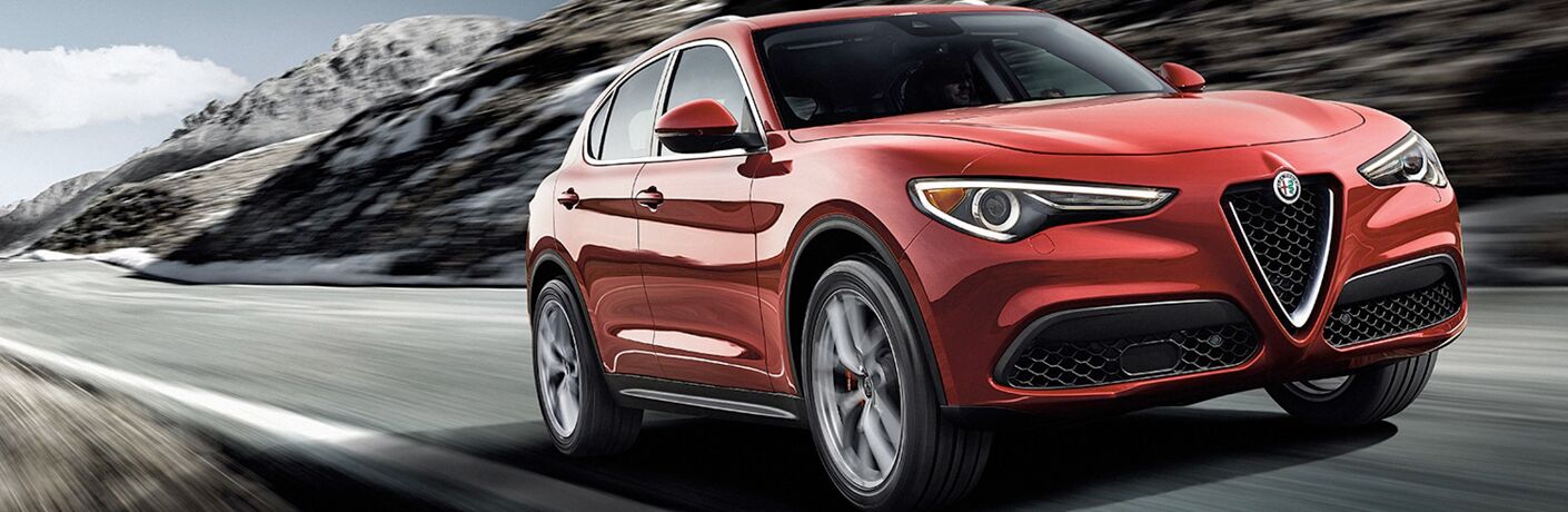 Red 2018 Alfa Romeo Stelvio on a Highway