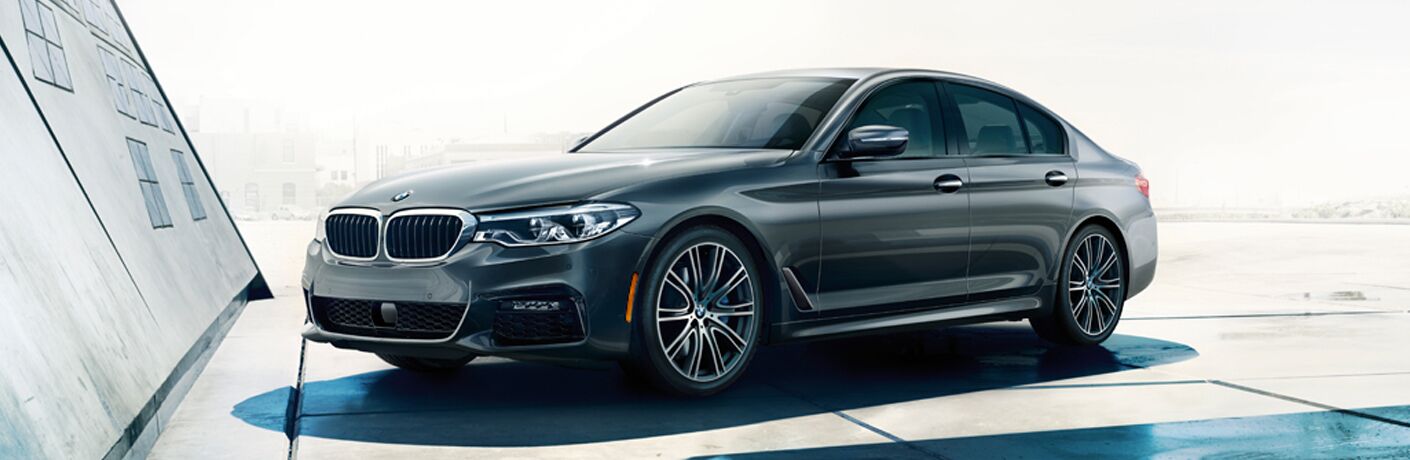 Gray 2018 BMW 5 Series Parked in a Driveway