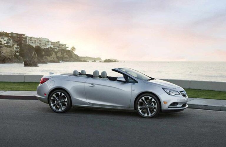 Silver 2018 Buick Cascada on a Coast Road with Convertible Top Down