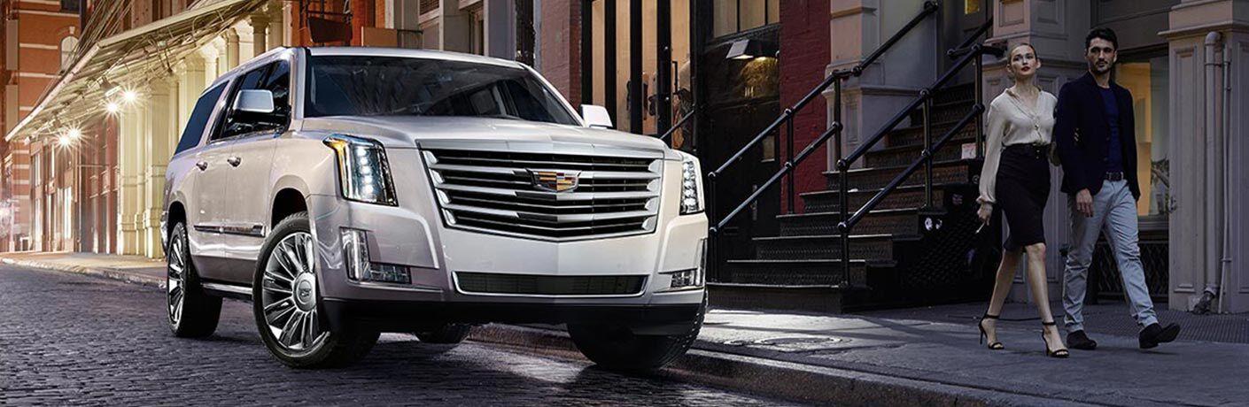 Silver 2018 Cadillac Escalade on a City Street