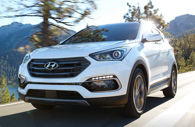 White 2018 Hyundai Santa Fe on a Country Road