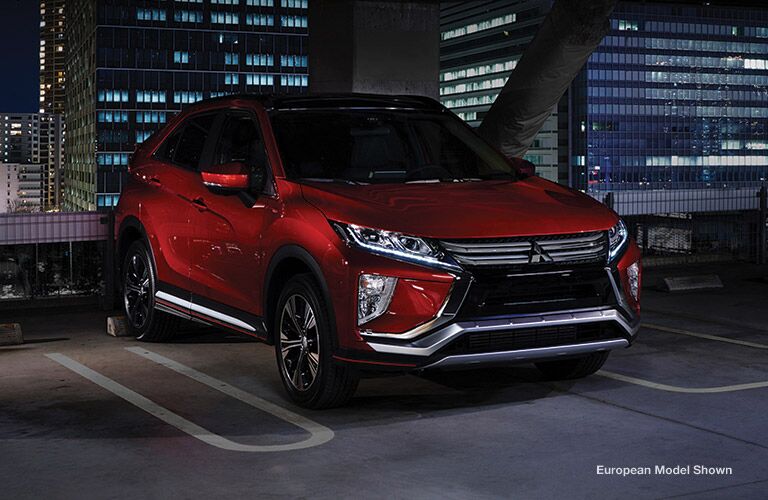 Red 2018 Mitsubishi Eclipse Cross in a Parking Structure