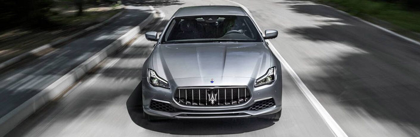 Silver 2018 Maserati Quattroporte Front Exterior Driving on a City Street