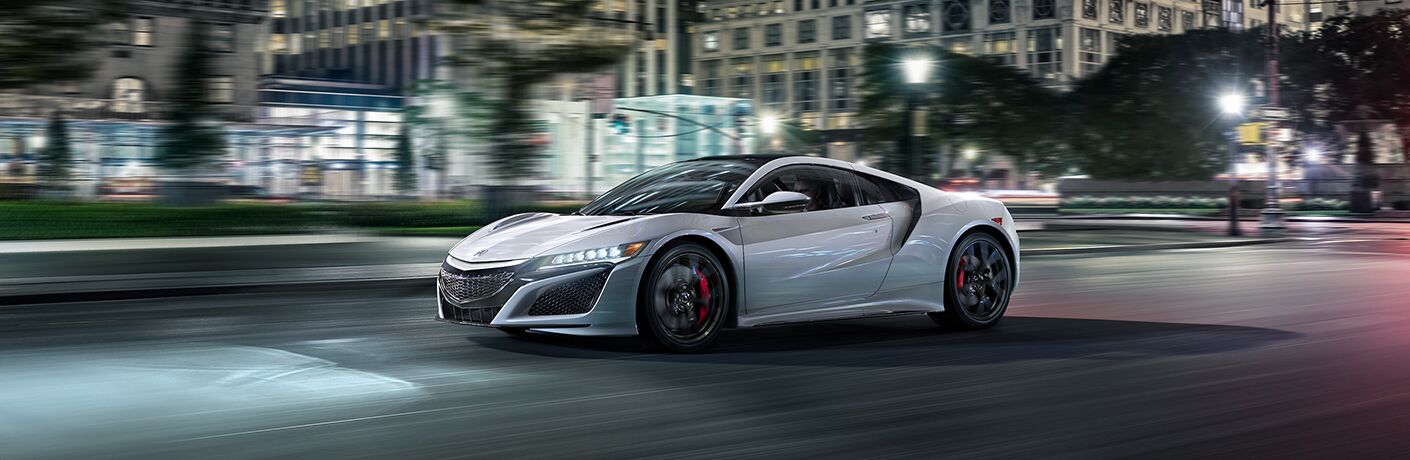 Silver 2019 Acura NSX on a City Street at Night