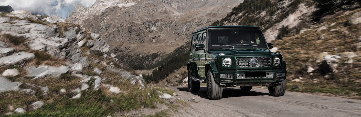 Green 2019 Mercedes-Benz G-Class on a Mountain Road