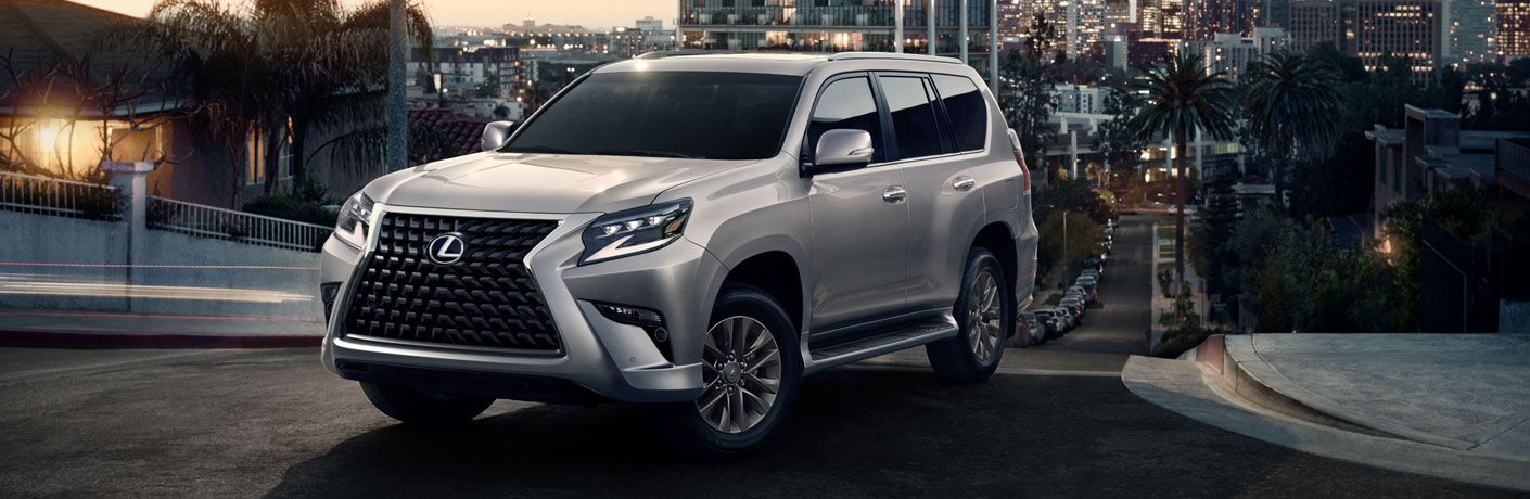 Silver 2020 Lexus GX on a City Street at Night