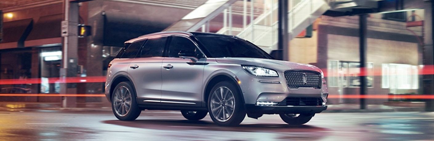 Silver 2020 Lincoln Corsair on a City Street at Night