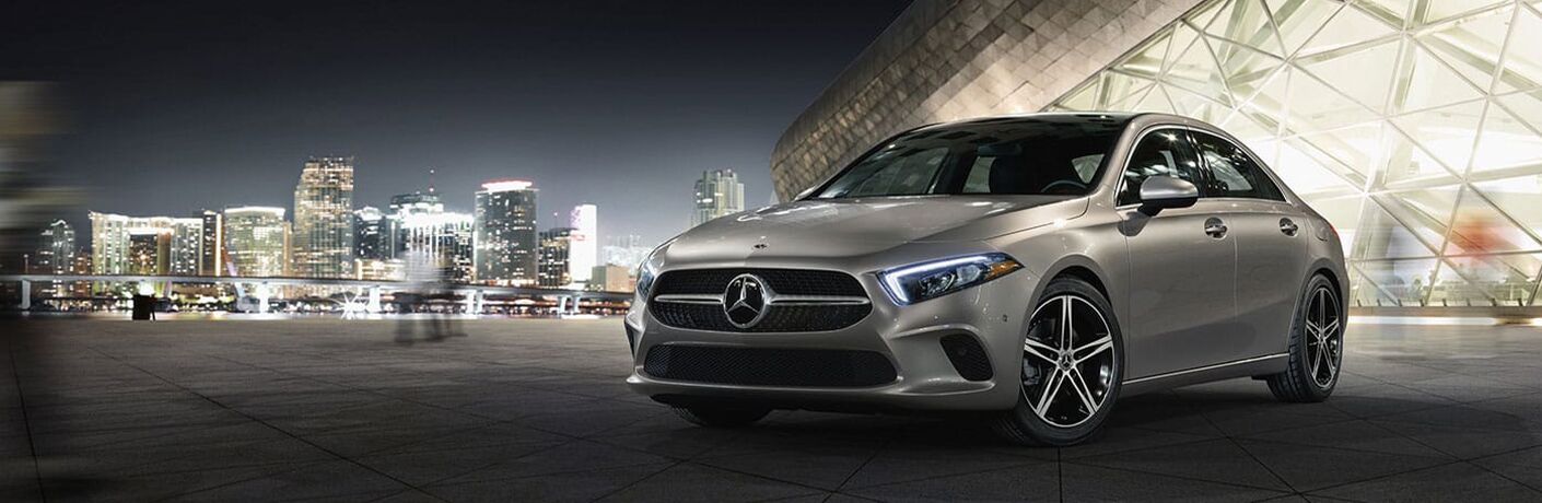 Gray 2020 Mercedes-Benz A-Class in Front of City Skyline at Night