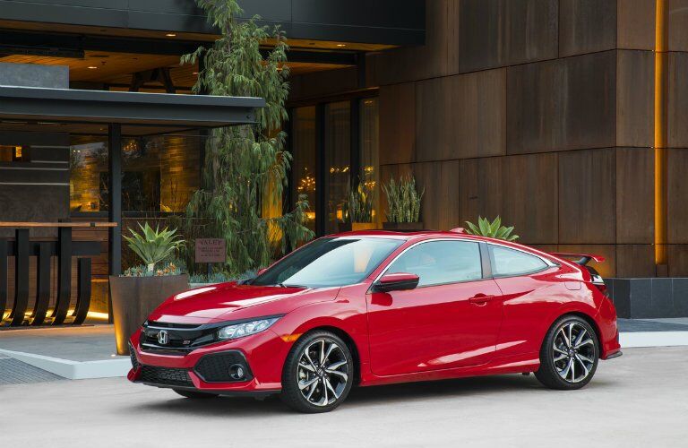 2017 Honda Civic Si parked in front of a house