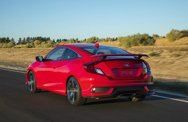 2017 Honda Civic Si driving down the highway