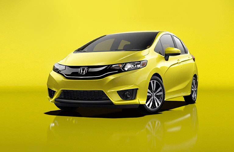Yellow Honda Fit in an all-yellow environment.