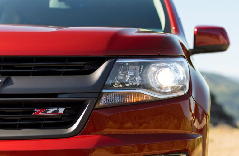 2017 Chevy Colorado red grille headlight front view