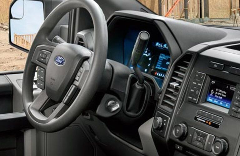 View of the steering wheel and dashboard of the Akins Ford 2016 Ford F-150