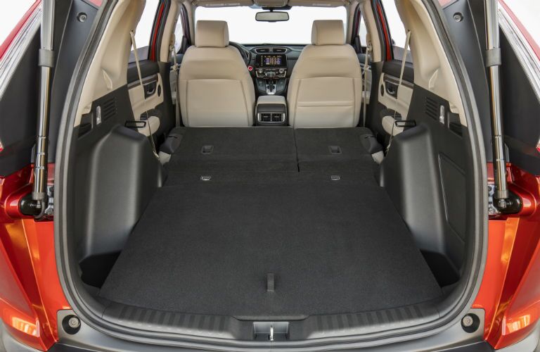 A photo showing how much cargo space is available in the 2018 Honda CR-V with the seats folded down.