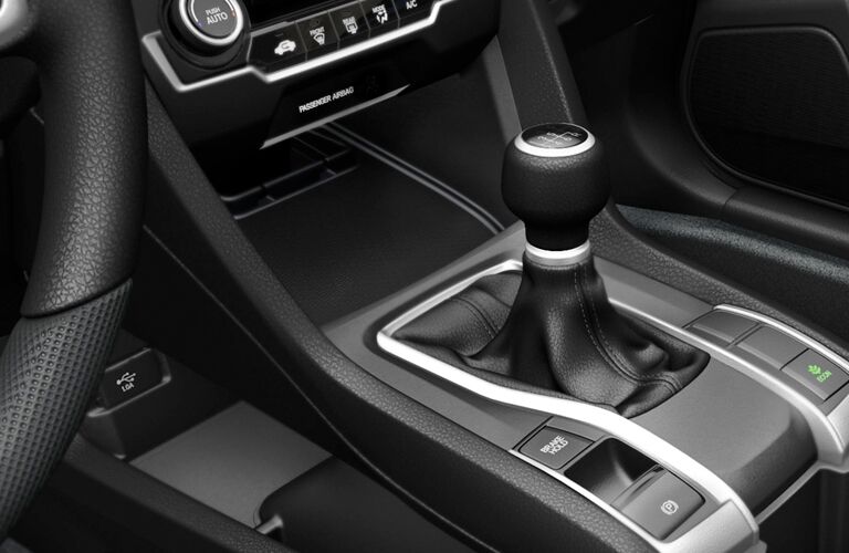 A photo of the gear-shifter for the six-speed manual in the 2018 Civic.