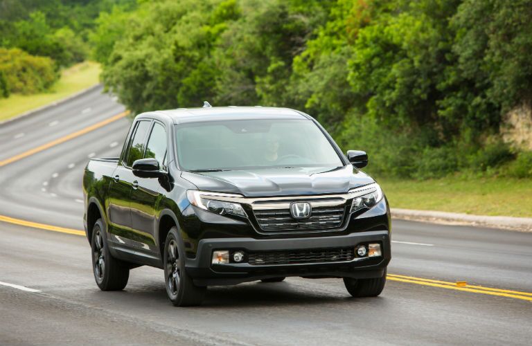 A head-on photo of the 2019 Ridgeline on the road.