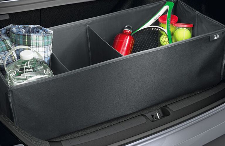 Another interior photo of the 2018 Accord with a cargo tray installed in the trunk.