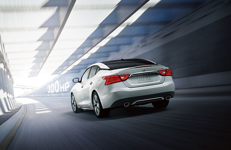 White 2018 Nissan Maxima driving through tunnel