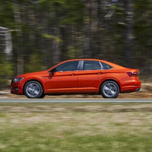 Side profile of orange 2019 Volkswagen Jetta