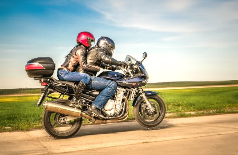 Traveling as a couple can be fun when safely riding a used motorcycle from Joe's Auto Sales