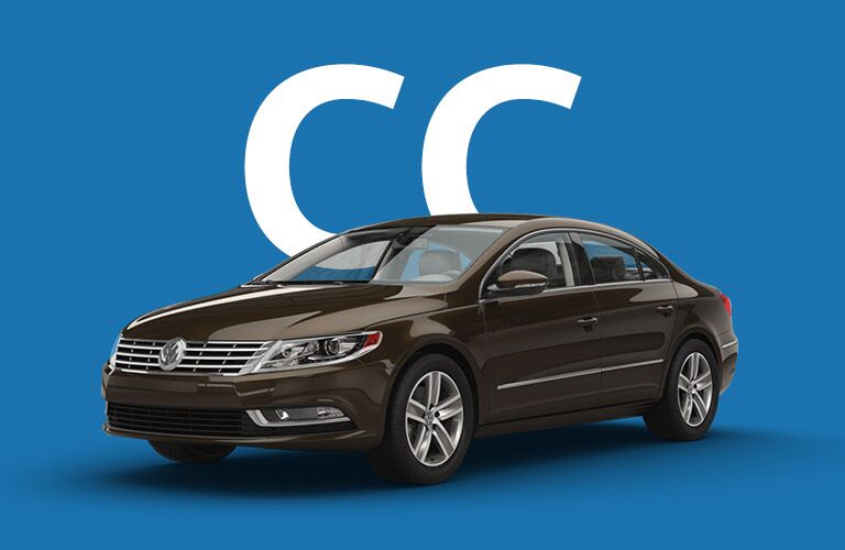 Black Volkswagen CC sits in front of a blue background and giant white letters that read, "CC."