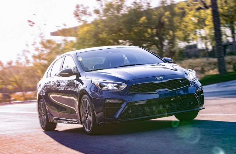 2020 kia forte gt in blue driving