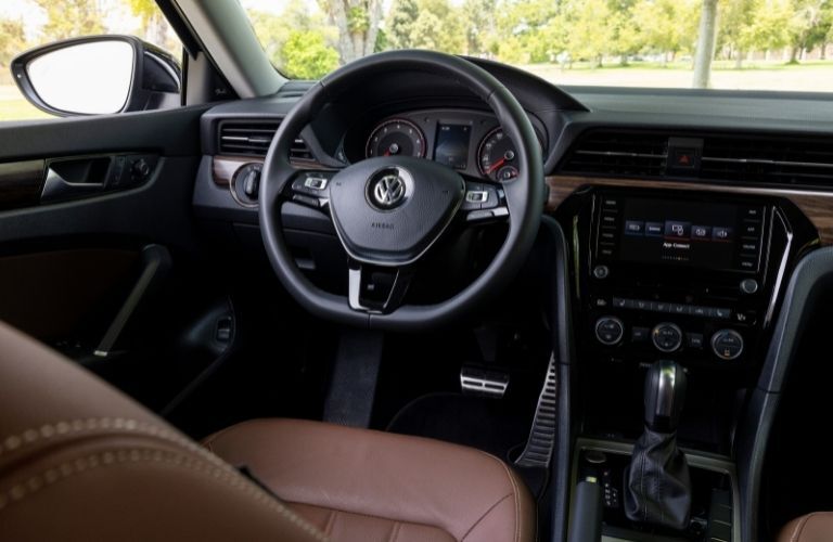 2022 VW Passat interior cabin image of the steering wheel and infotainment system