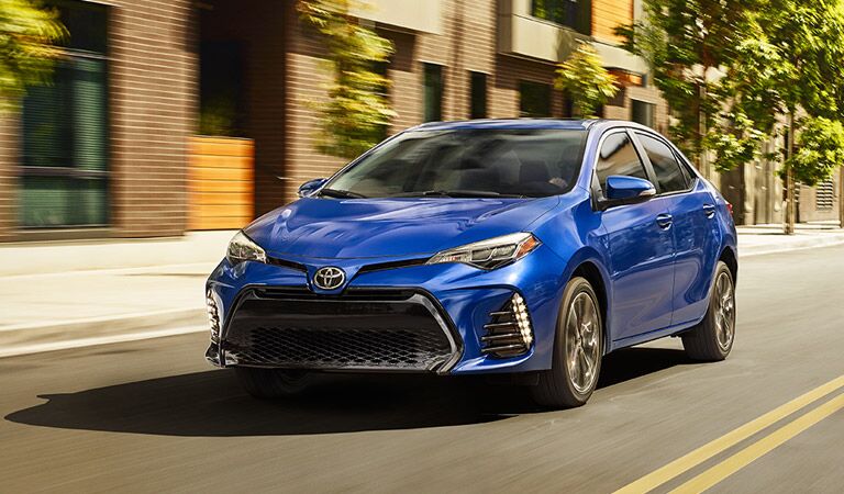 2017 Toyota Corolla driving down street