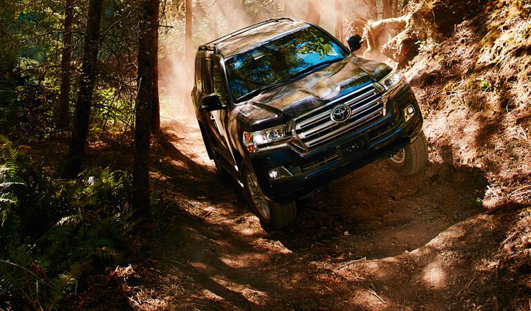 2017 Toyota Land Cruiser driving through forest
