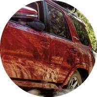closeup of driver's side of red 2018 Toyota 4Runner