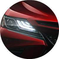 red 2018 Toyota Camry headlight closeup