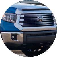 closeup of grille and headlight on 2018 Toyota Tundra
