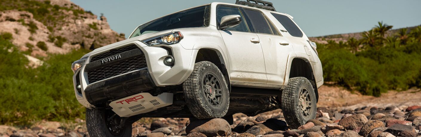2019 Toyota 4Runner front fascia and drivers side on rocky terrain
